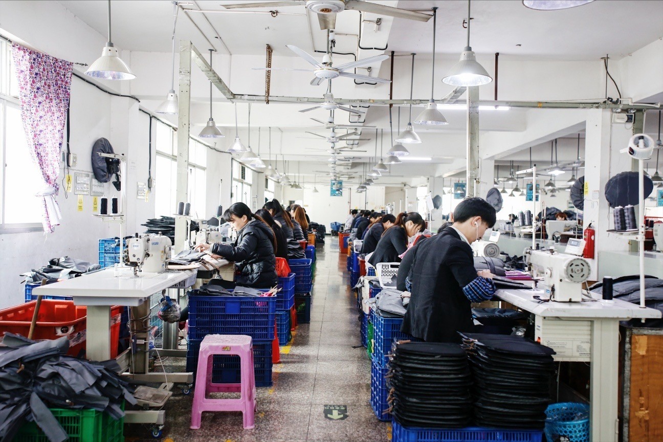 Computerized sewing workstations and dedicated line stitchers